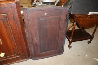 A 19th Century oak corner cupboard
