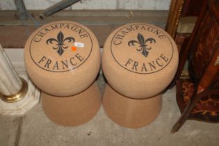 A pair of novelty stools in the form of Champagne