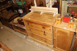 A stripped pine dressing chest fitted three long d