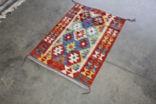 An approx. 4'2" x 2'10" Chobi Kelim rug