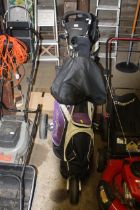 A MacGregor golf bag and contents of clubs includi