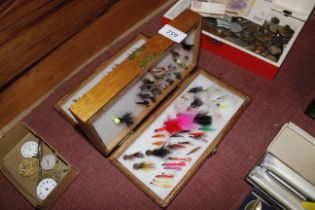 A box of fishing flies