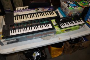 A Casio SA-46 keyboard and a Yamaha PSS-170 keyboa