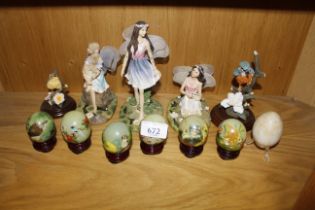 A collection of decorated hardstone eggs and fairy