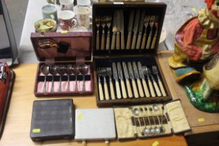 A collection of various boxed and cased cutlery