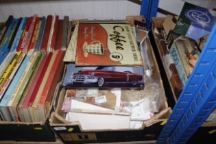 A box of various signs, craft items etc.