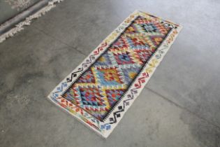 An approx. 5'6" x 2'3" Chobi Kelim runner