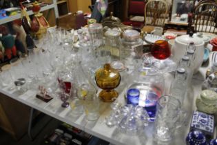 A large collection of various table glassware to i