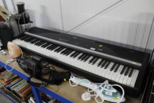 A Roland EP880 digital piano