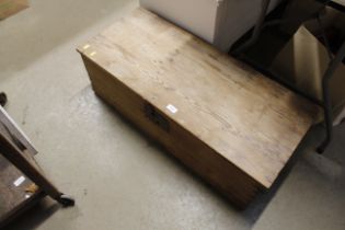 A stripped pine storage box