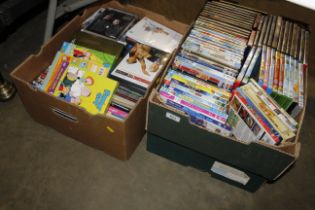Three boxes of various DVD's