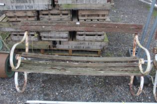 A vintage wooden slatted garden bench