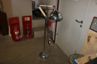 An Angle poise style standard lamp