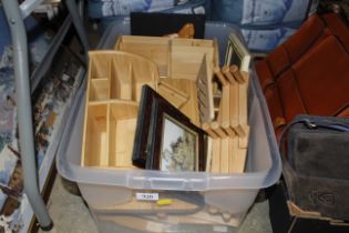 A box of various wooden items to include stationar