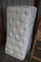 A Staples single divan bed