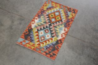 An approx. 3' x 1'11" Chobi Kelim rug