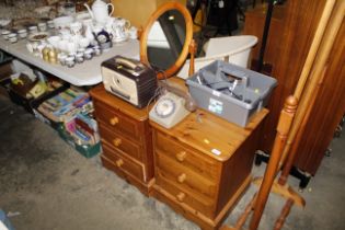 A pair pine three drawer bedside chests and a pine