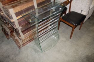 A Green Apple glass display stand