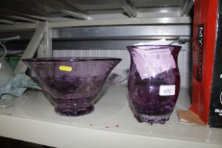 A lilac crystal vase and another lilac bowl with b