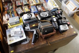 A quantity of various cameras, accessories etc.