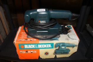 A Black & Decker KA175 electric sander and original box