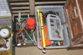 Two boxes containing various tools including wood m