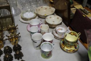 A collection of various patterned teaware to inclu