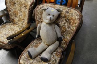 A vintage teddy bear in need of attention