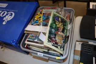 A box of DC and other comics