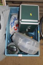 A box containing various camping related items to