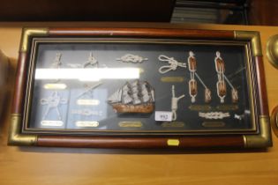 A framed and glazed display of ships knots
