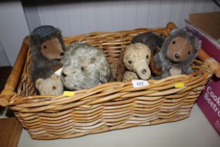 A wicker basket and contents of various teddy bear