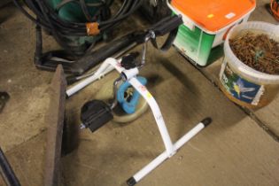 A pedal exerciser, dumbbell weight and circular ba