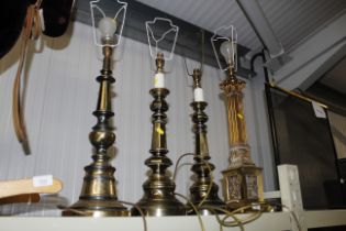 A brass Corinthian column table lamp, a pair of br