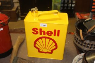 A Shell two gallon fuel can (215)