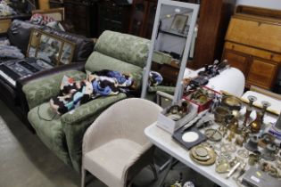 A grey cheval mirror and a loom chair