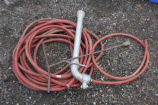 A hydrant stand pipe and quantity of hose