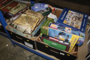 Two boxes of miscellaneous games and puzzles
