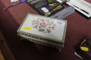 A trinket box and contents of costume jewellery