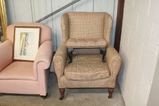 A Victorian wingback armchair and similar foot sto