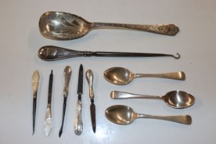 Three silver teaspoons, a collection of silver handled and other manicure items, silver handled