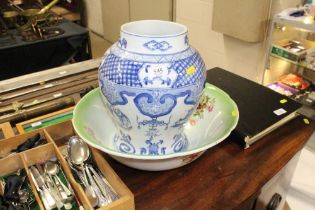 A blue & white oriental vase with character marks