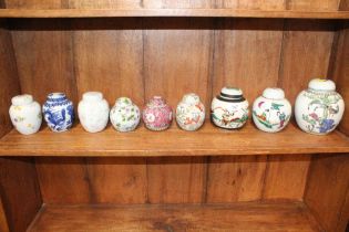 A collection of various ginger jars