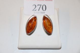 A pair of large vintage sterling silver and amber