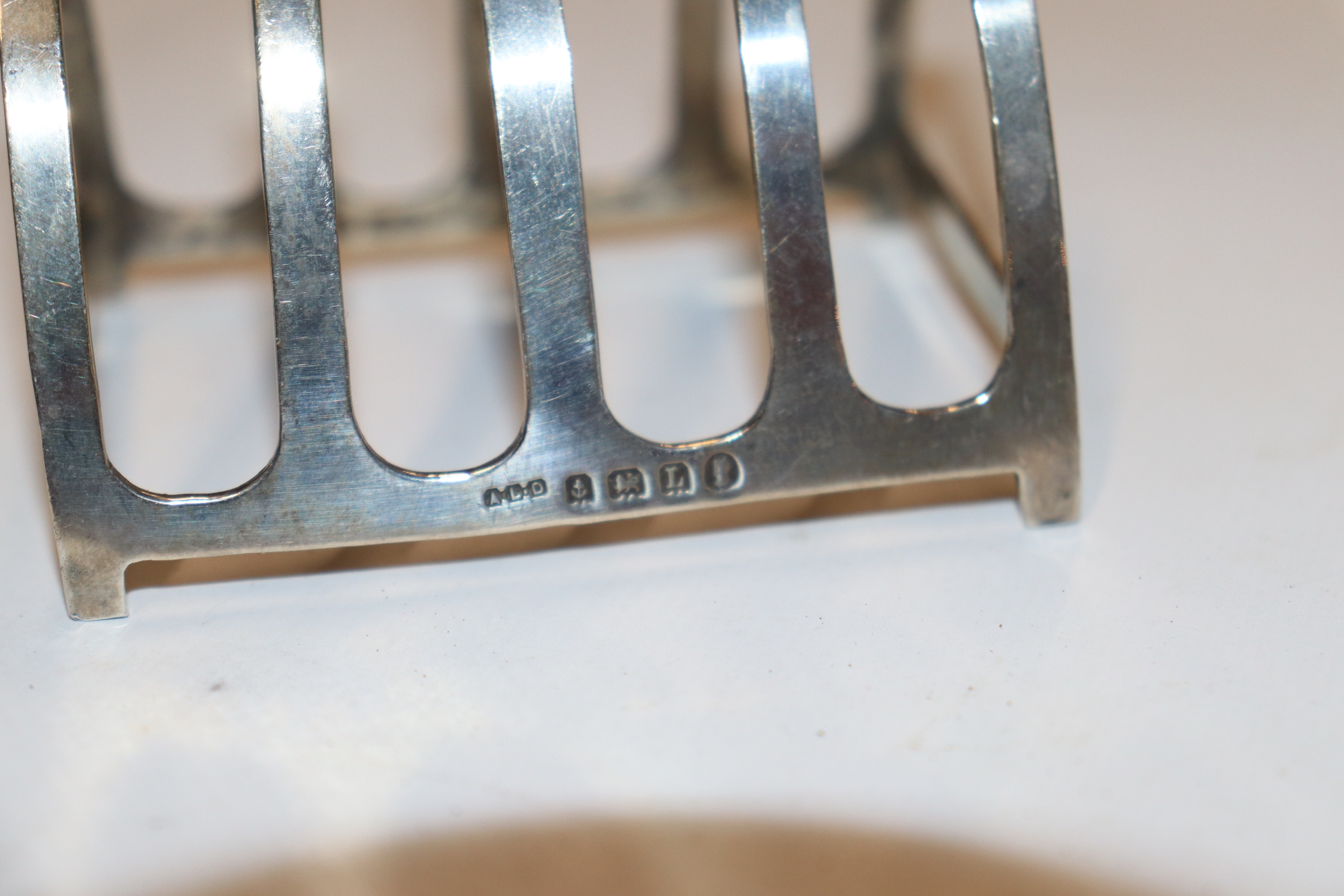 A silver four slice toast rack, hallmark Birmingham 1935 maker A L Davenport Ltd approx. 40gms - Image 2 of 2