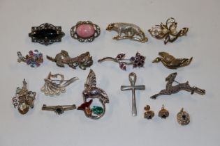 A box of costume brooches