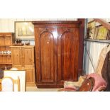 A Victorian mahogany two door wardrobe interior fi