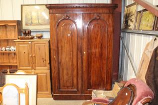 A Victorian mahogany two door wardrobe interior fi