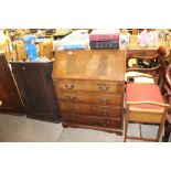 A mahogany bureau fitted four drawers