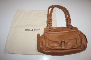 Three lady's handbags to include a tan example by